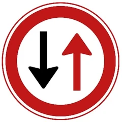 Señal F5: Prohibido seguir si se acerca tráfico en sentido contrario (ceda el paso al que viene)